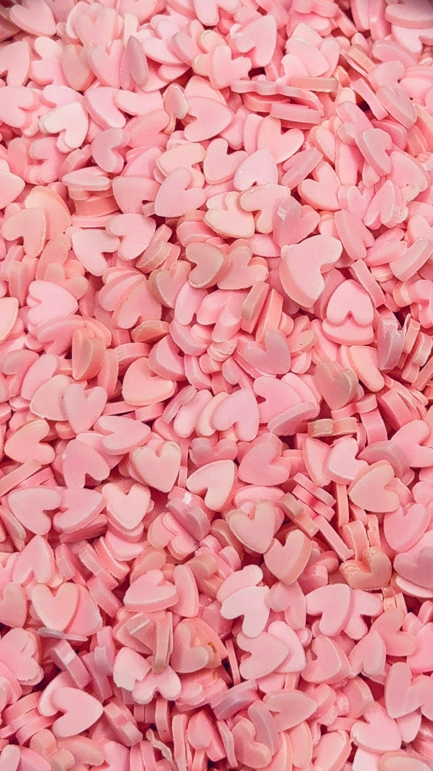Glow in the dark pink hearts Polymer Clay 5mm