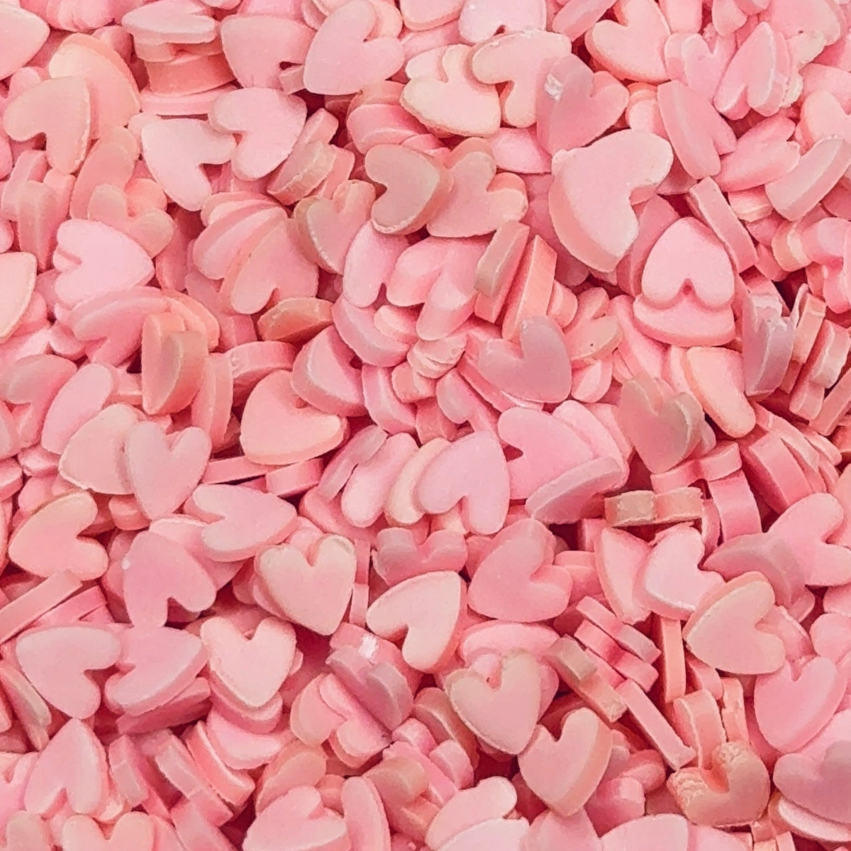 Glow in the dark pink hearts Polymer Clay 5mm